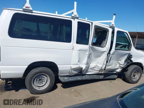 2014 Ford Econoline Passenger XL with VIN 1FBNE3BL7EDA37146, listed as a IAAI auction lot 41871526 with 139,387 mi miles. Bid and sale history available at carsss.com. Image 14.