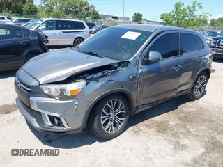 2018 Mitsubishi Outlander SE with VIN JA4AP3AW9JU012575, listed as a IAAI auction lot 42303672 with 97,524 mi miles and . Bid and sale history available at DreamBid. Image 2.