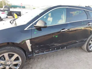 2012 Cadillac SRX Performance Collection with VIN 3GYFNBE35CS617766, listed as a IAAI auction lot 41864670 with 52,350 mi miles. Bid and sale history available at carsss.com. Image 6.