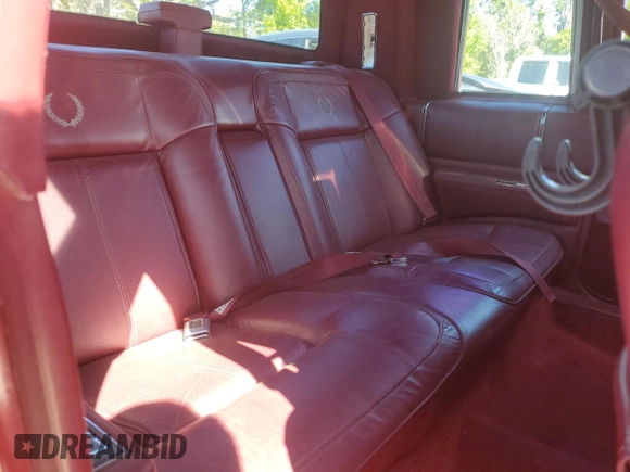 1991 Cadillac DeVille z VIN 1G6CD13B7M4306411, wystawiony jako Copart lot #50128155 z przebiegiem Nie podano mil oraz Szkoda całkowita • Salvage title. Historia ofert i sprzedaży dostępna na DreamBid. Obrazek 10.