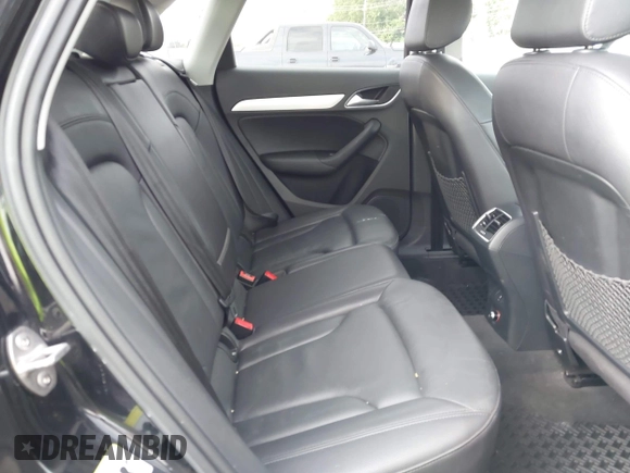 2015 Audi Q3 Premium Plus z VIN WA1EFCFS6FR001473, wystawiony jako IAAI lot #42795951 z przebiegiem 148 638 mil mil oraz . Historia ofert i sprzedaży dostępna na DreamBid. Obrazek 8.