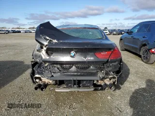 2017 BMW M6 z VIN WBS6E9C52HG437288, wystawiony jako Copart lot #38576804 z przebiegiem 25 137 mil mil oraz Tytuł czysty. Historia ofert i sprzedaży dostępna na DreamBid. Obrazek 6.
