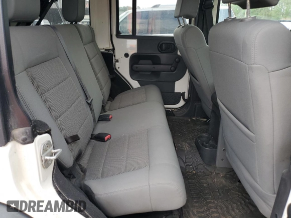 2008 Jeep Wrangler Rubicon z VIN 1J8GA69198L614736, wystawiony jako Copart lot #50826545 z przebiegiem 124 801 mil mil oraz Czysty tytuł • Clean title. Historia ofert i sprzedaży dostępna na DreamBid. Obrazek 11.