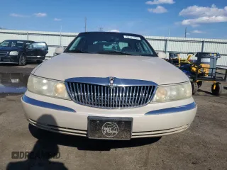 1999 Lincoln Continental with VIN 1LNHM97V1XY610090, listed as a Copart auction lot 50447685 with 105,375 mi miles and Clean Title. Bid and sale history available at DreamBid. Image 5.