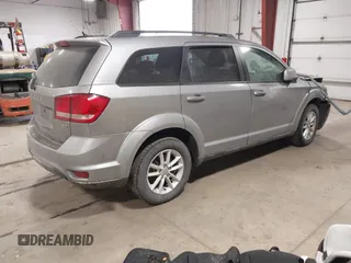 2016 Dodge Journey SXT with VIN 3C4PDCBG0GT198686, listed as a IAAI auction lot 41561007 with 85,289 mi miles. Bid and sale history available at carsss.com. Image 4.