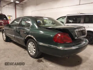 2001 Lincoln Continental with VIN 1LNHM97V11Y691910, listed as a IAAI auction lot 41501779 with 102,715 mi miles. Bid and sale history available at carsss.com. Image 3.