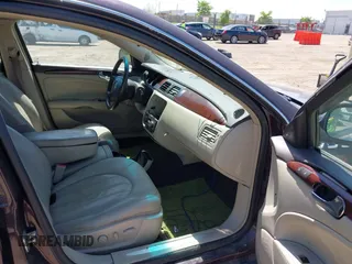 2009 Buick Lucerne CXL with VIN 1G4HD57M09U129435, listed as a IAAI auction lot 41950701 with 202,100 mi miles and . Bid and sale history available at DreamBid. Image 5.