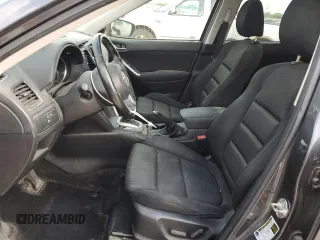 2015 Mazda CX-5 Touring with VIN JM3KE4CY0F0517821, listed as a Copart auction lot 53937195 with 165,852 mi miles and Salvage Title. Bid and sale history available at DreamBid. Image 7.
