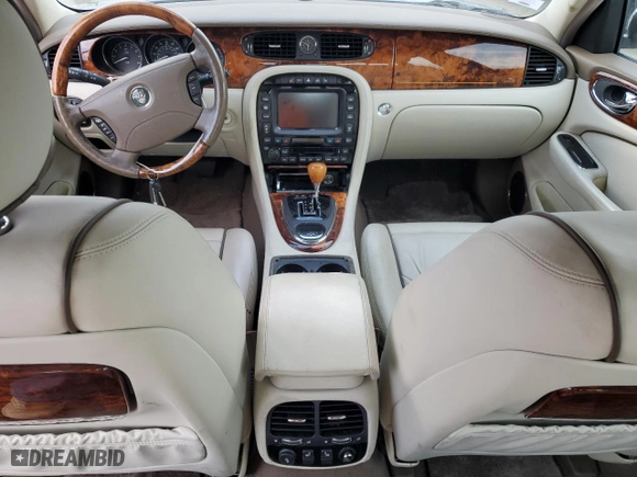 2005 Jaguar XJ VDP with VIN SAJWA82C45SG36059, listed as a Copart auction lot 69289734 with NaN miles and Salvage Title. Bid and sale history available at carsss.com. Image 8.