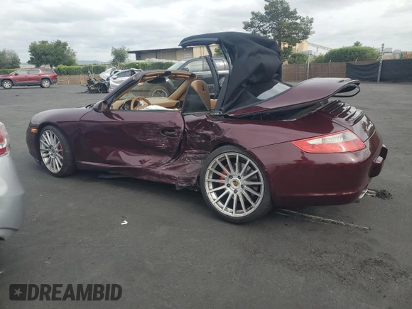 2006 Porsche 911 Carrera S z VIN WP0CB29956S769773, wystawiony jako Copart lot #54702225 z przebiegiem Nie podano mil oraz Szkoda całkowita • Salvage title. Historia ofert i sprzedaży dostępna na DreamBid. Obrazek 2.