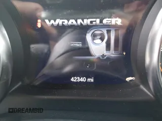 2021 Jeep Wrangler Unlimited Willys with VIN 1C4HJXDN5MW683251, listed as a IAAI auction lot 42075844 with 42,340 mi miles and . Bid and sale history available at DreamBid. Image 7.