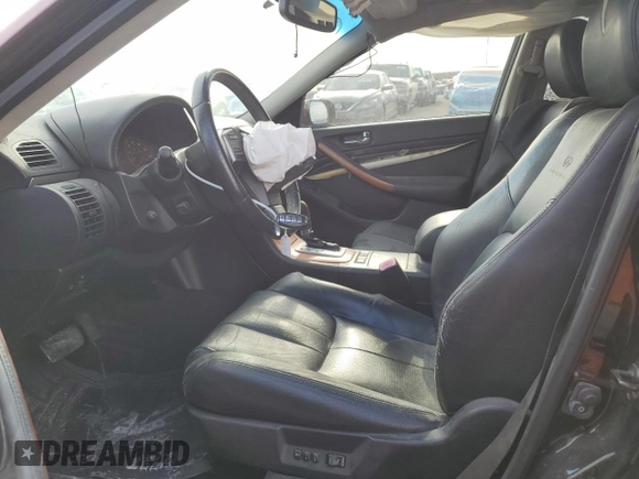 2006 Infiniti G35 z VIN JNKCV51F06M615940, wystawiony jako Copart lot #81223434 z przebiegiem 201 543 mil mil oraz Szkoda całkowita • Salvage title. Historia ofert i sprzedaży dostępna na DreamBid. Obrazek 7.