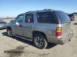 2003 GMC Yukon Denali z VIN 1GKEK63U93J339277, wystawiony jako Copart lot #42454275 z przebiegiem Nie podano mil oraz Szkody całkowita. Historia ofert i sprzedaży dostępna na DreamBid. Obrazek 2.