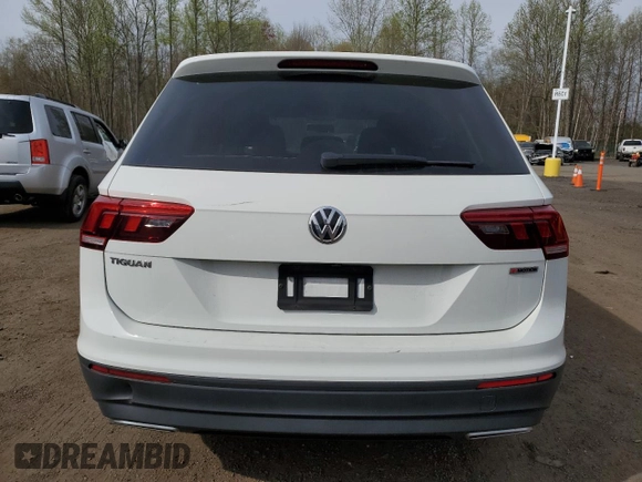 2019 Volkswagen Tiguan S with VIN 3VV0B7AX7KM106090, listed as a Copart auction lot 54771435 with 101,711 mi miles and Salvage title. Bid and sale history available at DreamBid. Image 6.