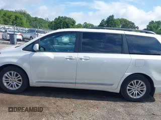 2016 Toyota Sienna XLE with VIN 5TDYK3DC4GS748888, listed as a IAAI auction lot 42605968 with 164,811 mi miles and . Bid and sale history available at DreamBid. Image 14.