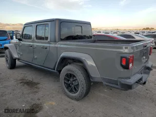 2023 Jeep Gladiator Sport S with VIN 1C6HJTAG7PL513453, listed as a Copart auction lot 43953825 with 9,788 mi miles and Salvage Title. Bid and sale history available at carsss.com. Image 2.