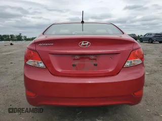 2012 Hyundai Accent GLS z VIN KMHCU4AE1CU270091, wystawiony jako Copart lot #56623905 z przebiegiem 185 477 mil mil oraz Szkody całkowita. Historia ofert i sprzedaży dostępna na DreamBid. Obrazek 6.