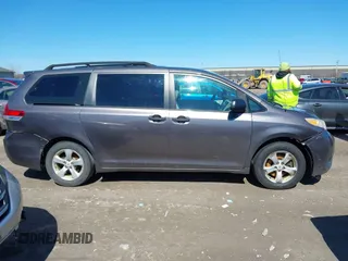2011 Toyota Sienna with VIN 5TDZK3DC6BS125737, listed as a IAAI auction lot 41815233 with 248,318 mi miles. Bid and sale history available at carsss.com. Image 13.
