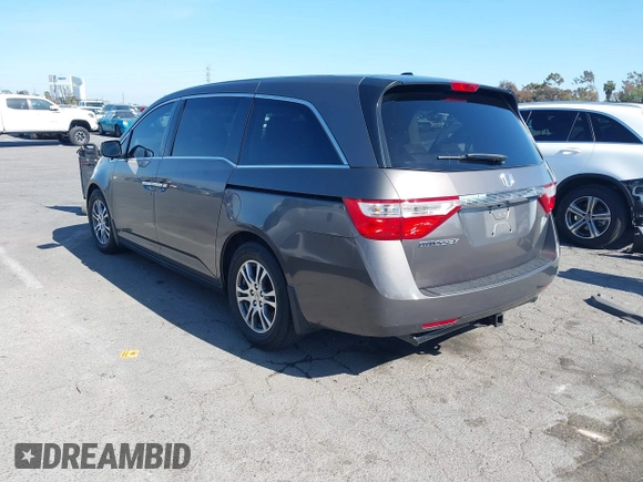 2011 Honda Odyssey EX-L with VIN 5FNRL5H68BB083492, listed as a IAAI auction lot 42087699 with 155,141 mi miles and . Bid and sale history available at carsss.com. Image 3.