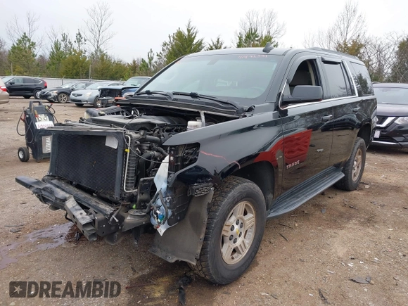 2020 Chevrolet Tahoe LS z VIN 1GNSCAKC1LR177807, wystawiony jako IAAI lot #41482578 z przebiegiem 75 010 mil mil oraz . Historia ofert i sprzedaży dostępna na DreamBid. Obrazek 2.