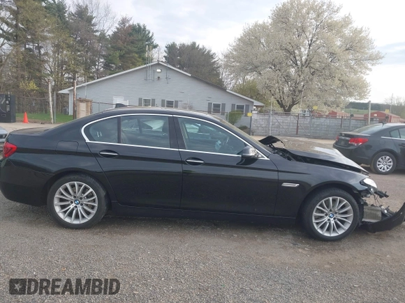 2014 BMW 5 Series 528i xDrive with VIN WBA5A7C52ED616976, listed as a IAAI auction lot 42067334 with 98,286 mi miles and . Bid and sale history available at DreamBid. Image 13.