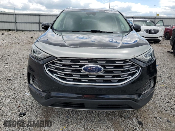 2019 Ford Edge Titanium with VIN 2FMPK4K94KBB35538, listed as a Copart auction lot 57770545 with 85,021 mi miles and Salvage title. Bid and sale history available at DreamBid. Image 5.