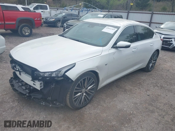 2024 Cadillac CT5 Premium Luxury z VIN 1G6DT5RW3R0129279, wystawiony jako IAAI lot #42011369 z przebiegiem 5 477 mil mil oraz . Historia ofert i sprzedaży dostępna na DreamBid. Obrazek 2.