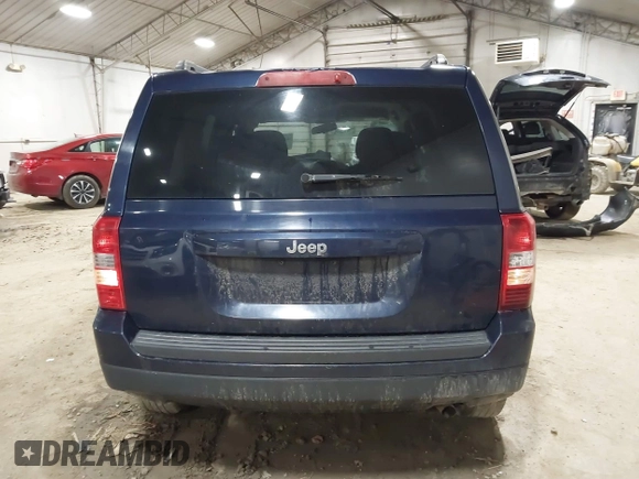 2014 Jeep Patriot Sport with VIN 1C4NJPBA1ED553340, listed as a IAAI auction lot 41212383 with 119,819 mi miles and . Bid and sale history available at DreamBid. Image 16.