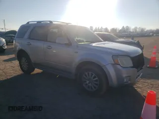 2008 Mercury Mariner Premier z VIN 4M2CU97108KJ43593, wystawiony jako Copart lot #62006105 z przebiegiem 124 233 mil mil oraz Szkoda całkowita • Salvage title. Historia ofert i sprzedaży dostępna na DreamBid. Obrazek 4.