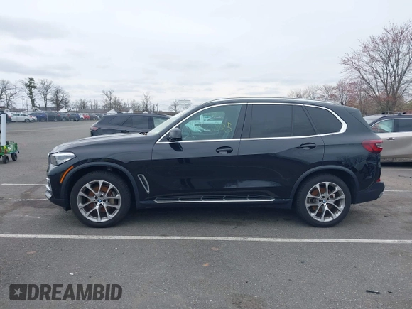2023 BMW X5 xDrive40i with VIN 5UXCR6C0XP9P90557, listed as a IAAI auction lot 41860825 with 49,737 mi miles. Bid and sale history available at carsss.com. Image 14.
