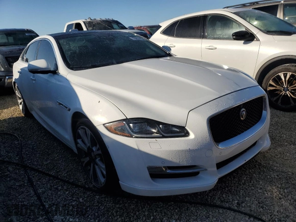 2019 Jaguar XJ with VIN SAJWJ1CD6K8W20725, listed as a Copart auction lot 76631854 with 25,261 mi miles and Salvage Title. Bid and sale history available at carsss.com. Image 4.