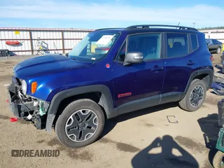 2017 Jeep Renegade Trailhawk z VIN ZACCJBCB5HPE96860, wystawiony jako IAAI lot #41734370 z przebiegiem 113 405 mil mil oraz . Historia ofert i sprzedaży dostępna na DreamBid. Obrazek 2.