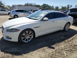2016 Jaguar XJ Portfolio with VIN SAJWA2G70G8W01136, listed as a Copart auction lot 50120455 with 92,224 mi miles and Salvage Title. Bid and sale history available at DreamBid. Image 1.