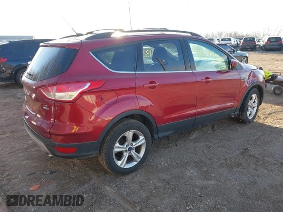 2015 Ford Escape SE with VIN 1FMCU9GX8FUB44465, listed as a IAAI auction lot 41826446 with 184,825 mi miles. Bid and sale history available at carsss.com. Image 4.
