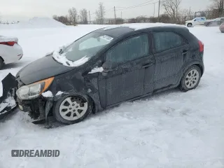 2015 Kia Rio LX with VIN KNADM5A3XF6715818, listed as a Copart auction lot 43217635 with 116,368 mi miles and Salvage Title. Bid and sale history available at carsss.com. Image 1.