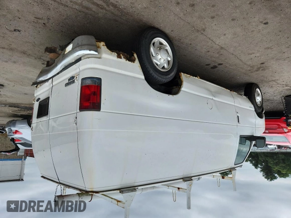 2006 Ford Econoline Cargo with VIN 1FTNE24L16HA86954, listed as a Copart auction lot 63314175 with 207,701 mi miles and Salvage title. Bid and sale history available at DreamBid. Image 2.