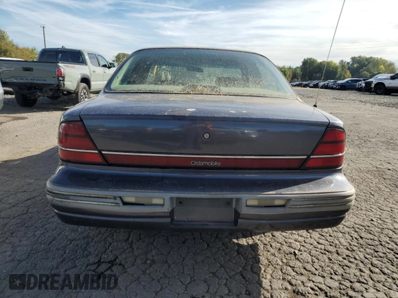 1993 Oldsmobile 88 z VIN 1G3HN53L4PH310087, wystawiony jako Copart lot #75523874 z przebiegiem 151 178 mil mil oraz Czysty tytuł • Clean title. Historia ofert i sprzedaży dostępna na DreamBid. Obrazek 6.