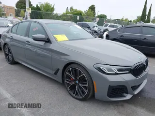 2022 BMW 5 Series M550i xDrive with VIN WBA13BK07NCL07995, listed as a IAAI auction lot 42454963 with 12,721 mi miles and . Bid and sale history available at DreamBid. Image 1.