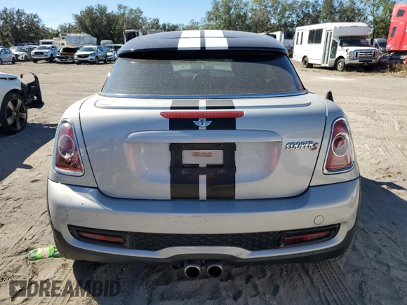 2014 MINI Coupe S z VIN WMWSX3C57ET409158, wystawiony jako Copart lot #81650034 z przebiegiem 118 523 mil mil oraz Szkoda całkowita • Salvage title. Historia ofert i sprzedaży dostępna na DreamBid. Obrazek 6.