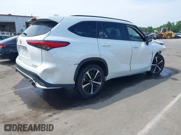 2022 Toyota Highlander XSE with VIN 5TDLZRBH2NS189006, listed as a IAAI auction lot 42298831 with 67,322 mi miles and . Bid and sale history available at DreamBid. Image 4.