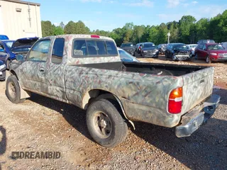 1999 Toyota Tacoma z VIN 4TAWM72N5XZ429880, wystawiony jako IAAI lot #42179697 z przebiegiem 311 261 mil mil oraz . Historia ofert i sprzedaży dostępna na DreamBid. Obrazek 3.