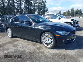 2015 BMW 3 Series 328i xDrive with VIN WBA3B5G50FNS16333, listed as a IAAI auction lot 41757977 with 69,601 mi miles. Bid and sale history available at carsss.com. Image 1.