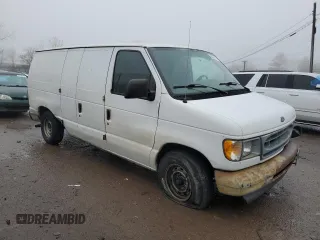2001 Ford Econoline Cargo with VIN 1FTRE142X1HB27593, listed as a Copart auction lot 83827154 with 190,761 mi miles and Salvage Title. Bid and sale history available at DreamBid. Image 4.