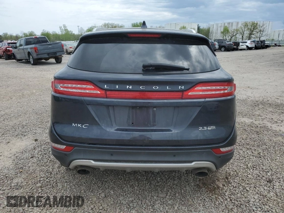 2015 Lincoln MKC z VIN 5LMTJ2AH9FUJ03616, wystawiony jako Copart lot #56681155 z przebiegiem 95 055 mil mil oraz Szkoda całkowita • Salvage title. Historia ofert i sprzedaży dostępna na DreamBid. Obrazek 6.