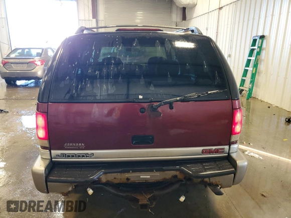 2001 GMC Jimmy SLE with VIN 1GKDT13W412139248, listed as a Copart auction lot 87383154 with 212,705 mi miles and Clean Title. Bid and sale history available at carsss.com. Image 6.