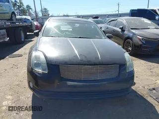 2004 Nissan Maxima SE z VIN 1N4BA41E64C893745, wystawiony jako IAAI lot #41675717 z przebiegiem Nie podano mil oraz . Historia ofert i sprzedaży dostępna na DreamBid. Obrazek 12.