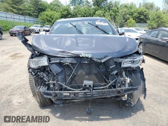 2014 Jeep Grand Cherokee Summit with VIN 1C4RJFJT2EC145918, listed as a Copart auction lot 62718985 with 164,145 mi miles and Clean title. Bid and sale history available at DreamBid. Image 5.