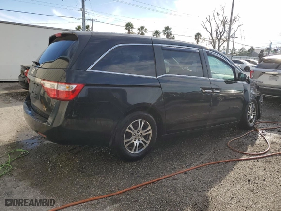 2012 Honda Odyssey EX-L with VIN 5FNRL5H67CB075837, listed as a Copart auction lot 46644975 with 166,595 mi miles and Salvage Title. Bid and sale history available at carsss.com. Image 3.