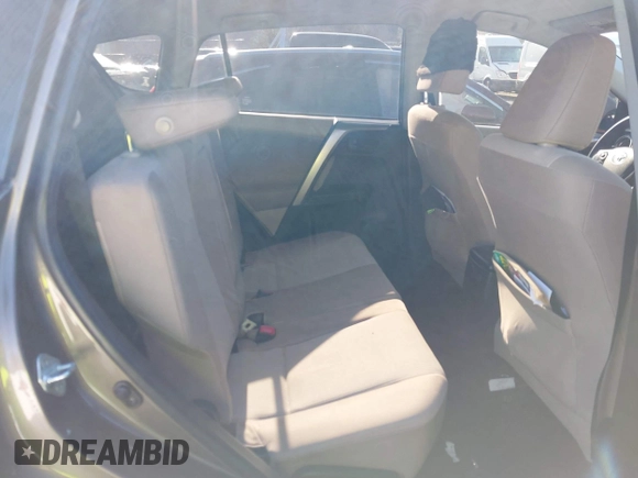 2013 Toyota RAV4 LE with VIN JTMBFREV9D5009241, listed as a IAAI auction lot 42003982 with 117,673 mi miles and . Bid and sale history available at DreamBid. Image 8.