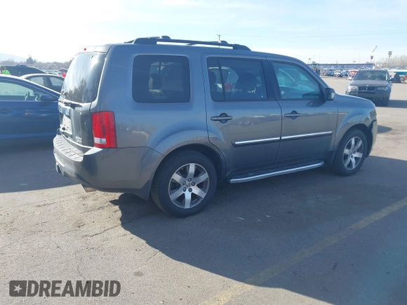 2013 Honda Pilot Touring with VIN 5FNYF4H94DB035692, listed as a IAAI auction lot 41771116 with 137,464 mi miles and . Bid and sale history available at carsss.com. Image 4.